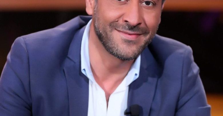 زوج امل عرفة